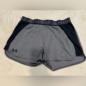 Women’s Under Armour athletic shorts, medium 
Pockets, gray
